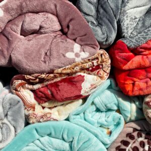 Colourful blankets in a shop window