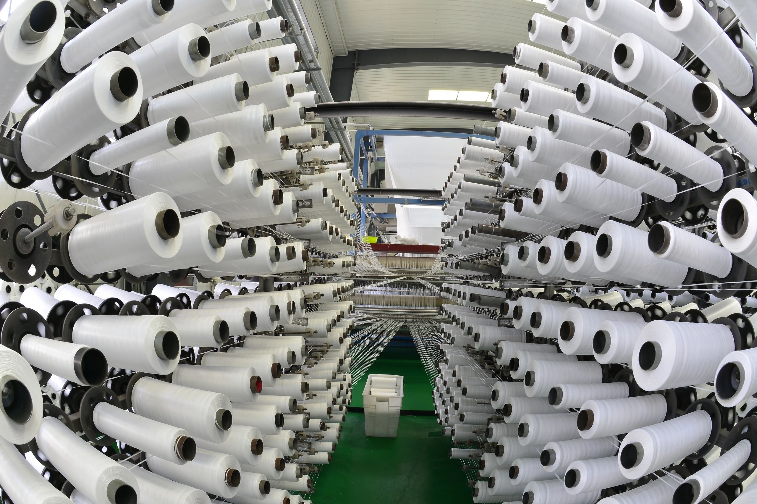 Modern textile production facility supporting blanket manufacturing