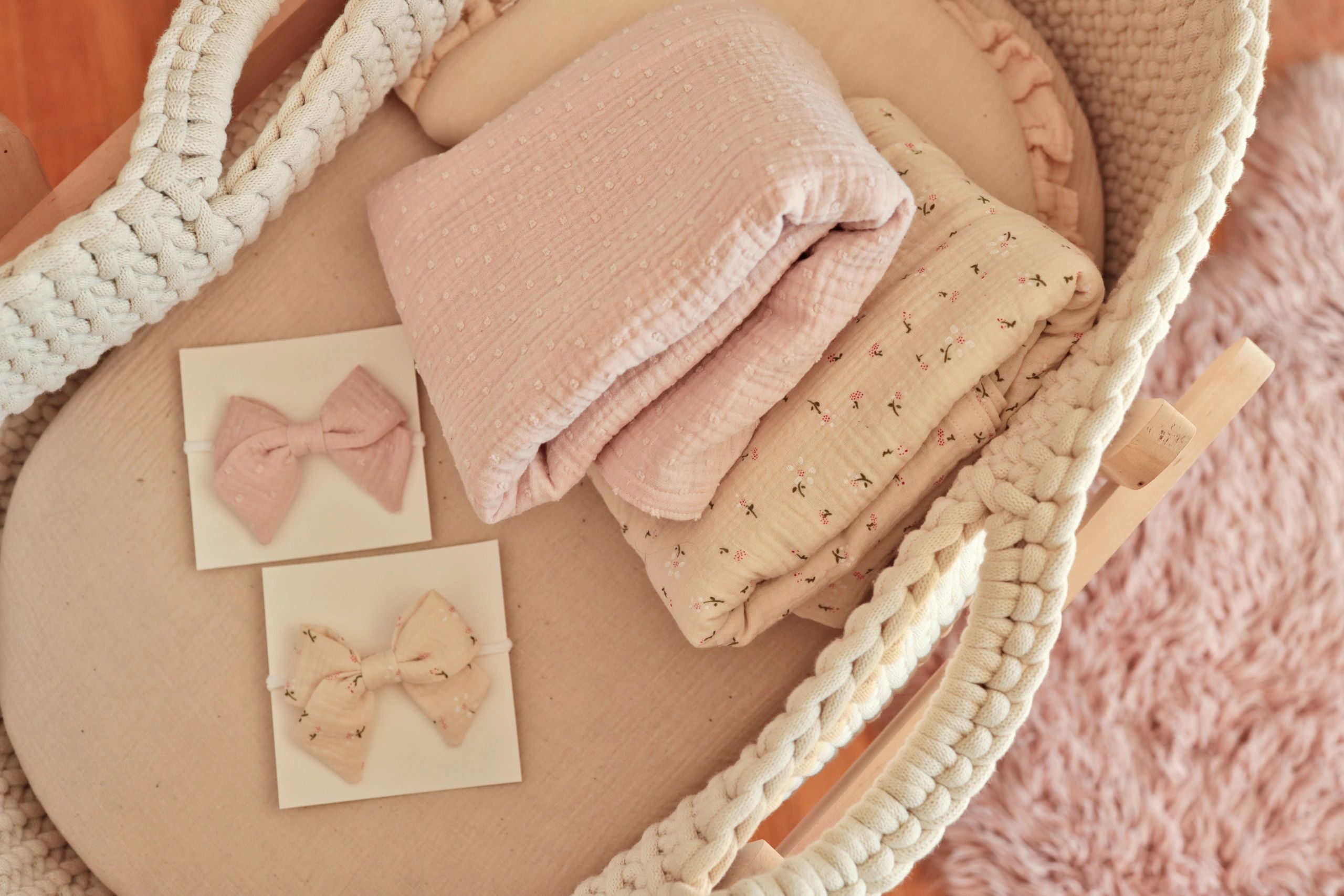 Soft baby blanket and accessories in a basket